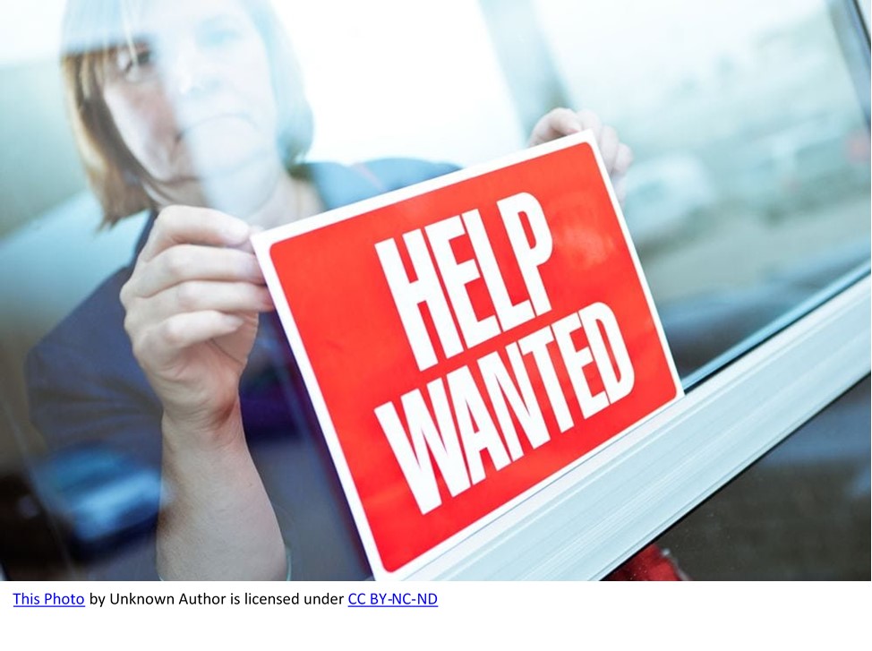 Help Wanted sign in window